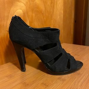 Black high heels, about a 2 1/2-3 inch heel, size 9